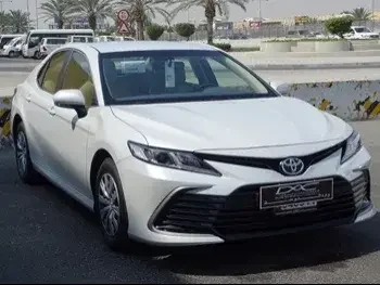 Toyota  Camry  LE  2023  Automatic  0 Km  4 Cylinder  Front Wheel Drive (FWD)  Sedan  White  With Warranty