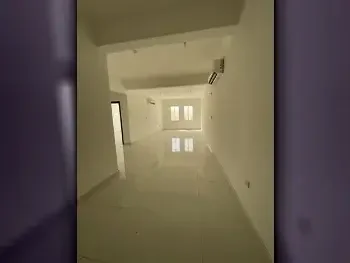 2 Bedrooms  Apartment  For Rent  in Umm Salal -  Umm Salal Ali  Not Furnished