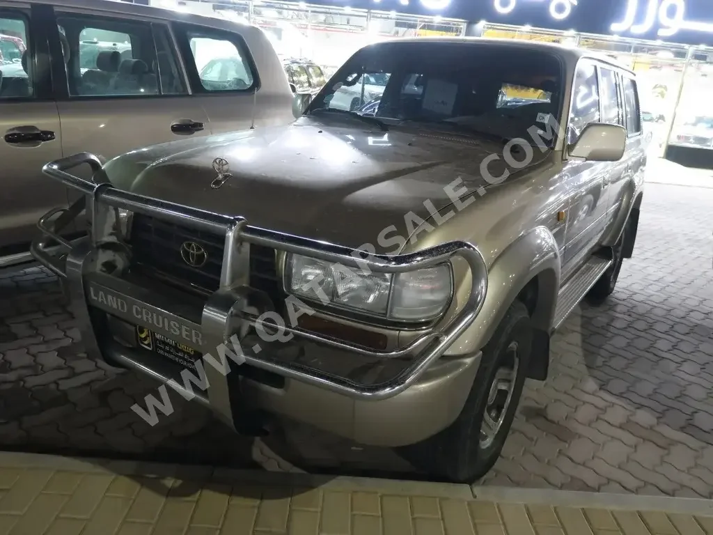 Toyota  Land Cruiser  1997  Automatic  448,985 Km  8 Cylinder  Four Wheel Drive (4WD)  SUV  Gold  With Warranty