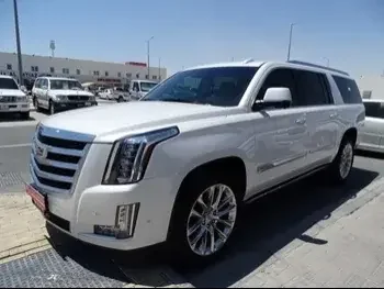 Cadillac  Escalade  2019  Automatic  105,000 Km  8 Cylinder  Four Wheel Drive (4WD)  SUV  White  With Warranty