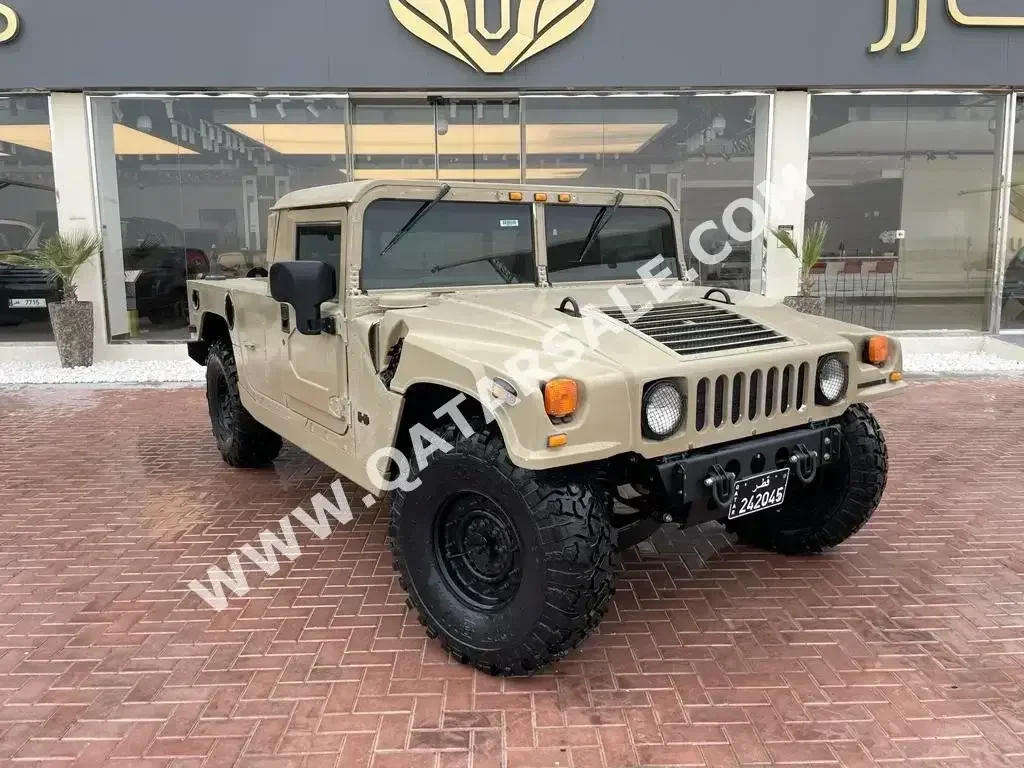 Hummer  H1  2003  Automatic  43,000 Km  8 Cylinder  Four Wheel Drive (4WD)  SUV  Beige  With Warranty