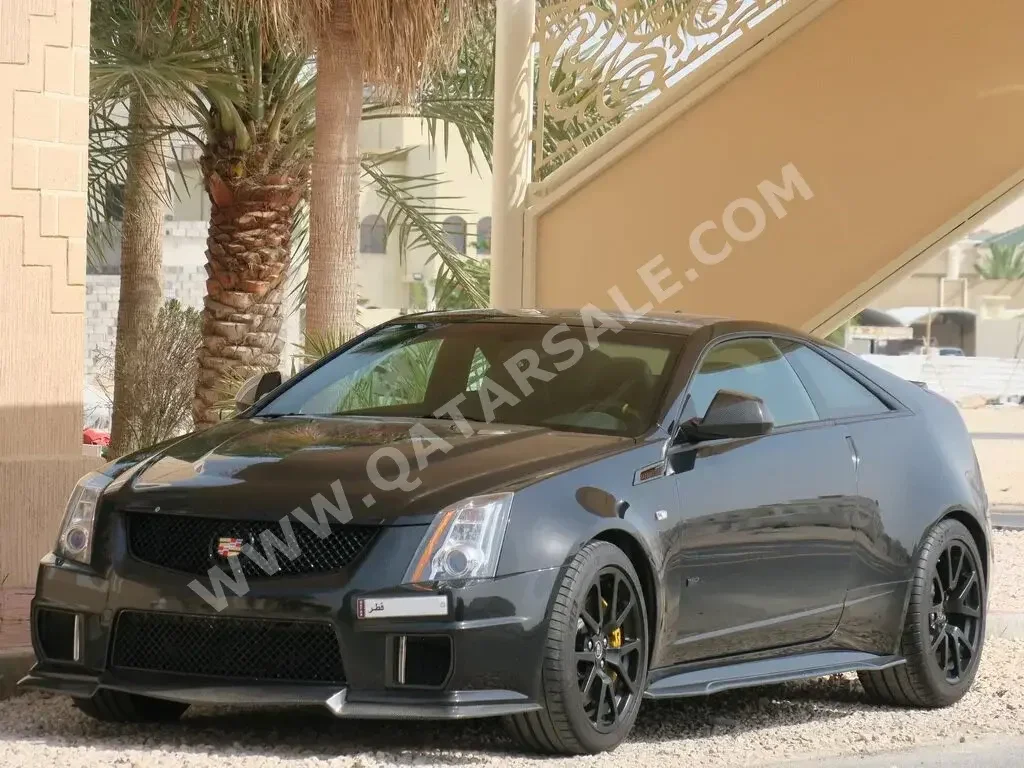 Cadillac  CTS  V-Supercharged  2011  Automatic  44,000 Km  8 Cylinder  Rear Wheel Drive (RWD)  Coupe / Sport  Black  With Warranty