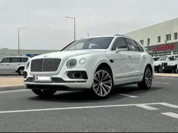 Bentley  Bentayga  2018  Automatic  67,000 Km  12 Cylinder  Four Wheel Drive (4WD)  SUV  White  With Warranty