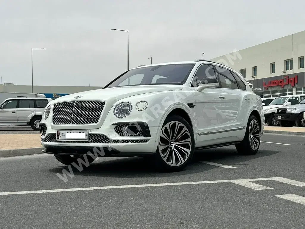 Bentley  Bentayga  2018  Automatic  67,000 Km  12 Cylinder  Four Wheel Drive (4WD)  SUV  White  With Warranty
