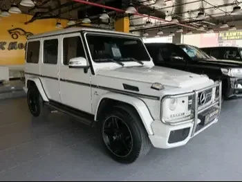 Mercedes-Benz  G-Class  63 AMG  2013  Automatic  167,000 Km  8 Cylinder  Four Wheel Drive (4WD)  SUV  White  With Warranty