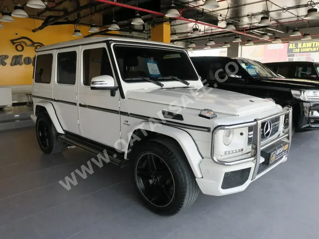 Mercedes-Benz  G-Class  63 AMG  2013  Automatic  167,000 Km  8 Cylinder  Four Wheel Drive (4WD)  SUV  White  With Warranty