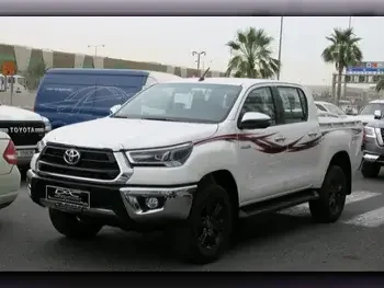 Toyota  Hilux  2022  Automatic  0 Km  4 Cylinder  Four Wheel Drive (4WD)  Pick Up  White  With Warranty