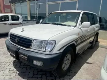 Toyota  Land Cruiser  GX  1998  Automatic  460,000 Km  6 Cylinder  Four Wheel Drive (4WD)  SUV  White  With Warranty