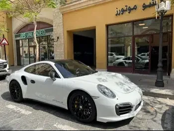 Porsche  911  Turbo S  2014  Automatic  45,000 Km  6 Cylinder  Rear Wheel Drive (RWD)  Coupe / Sport  White  With Warranty