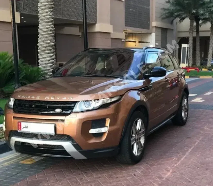 Land Rover  Evoque  2014  Automatic  150,000 Km  4 Cylinder  Four Wheel Drive (4WD)  SUV  Brown