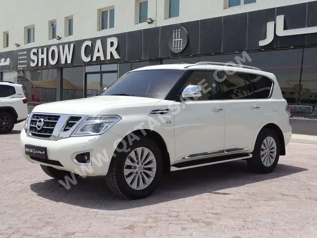  Nissan  Patrol  LE  2015  Automatic  130,000 Km  8 Cylinder  Four Wheel Drive (4WD)  SUV  White  With Warranty