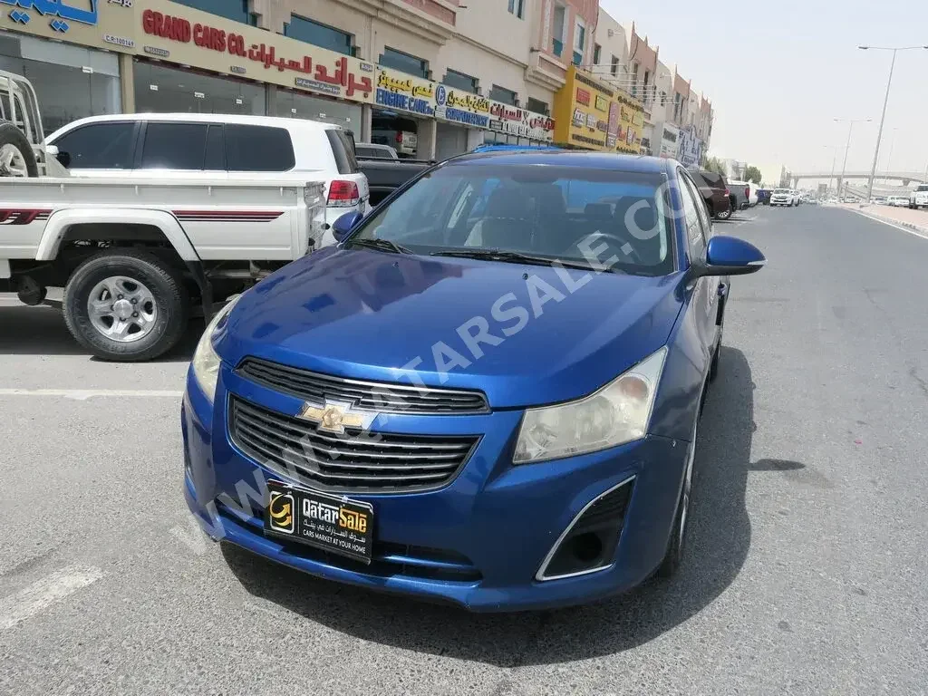 Chevrolet  Cruze  2014  Automatic  121,000 Km  4 Cylinder  Front Wheel Drive (FWD)  Sedan  Blue  With Warranty