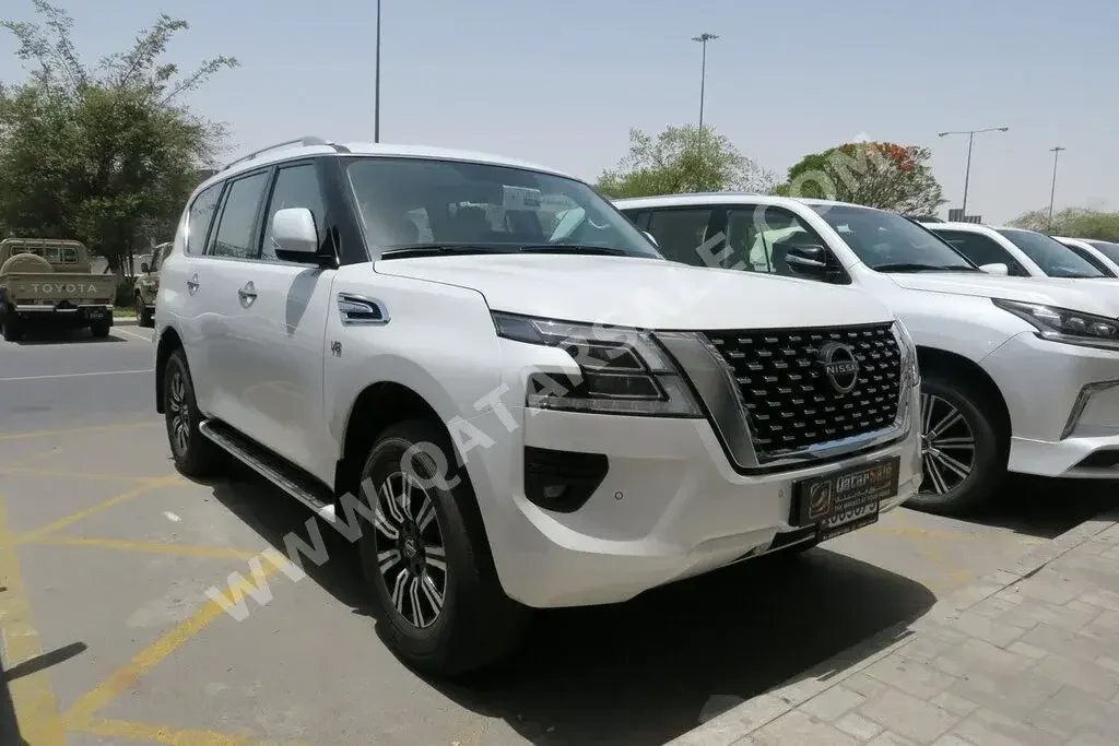 Nissan  Patrol  LE  2023  Automatic  0 Km  8 Cylinder  Four Wheel Drive (4WD)  SUV  White  With Warranty