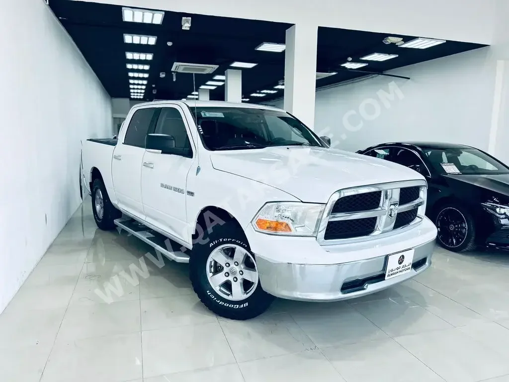 Dodge  Ram  1500  2012  Automatic  179,000 Km  8 Cylinder  Four Wheel Drive (4WD)  Pick Up  White  With Warranty