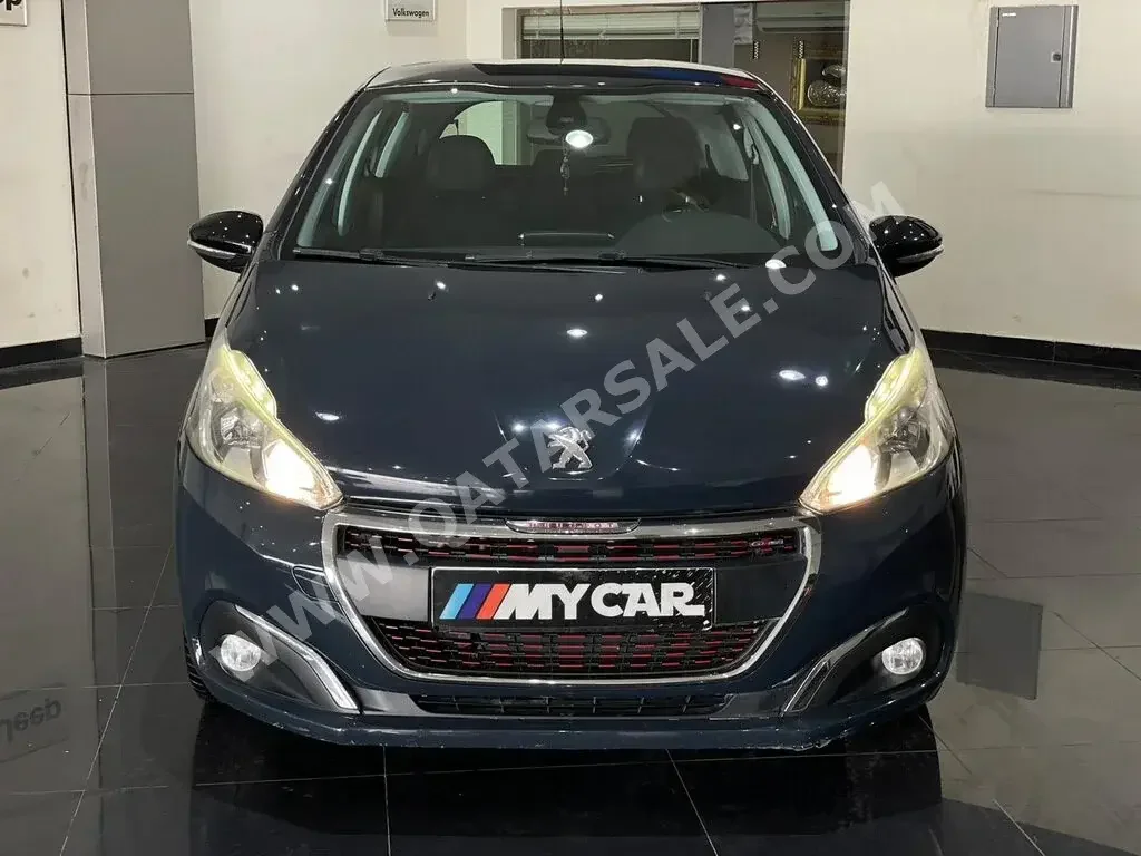 Peugeot  208  2017  Automatic  42,000 Km  4 Cylinder  Front Wheel Drive (FWD)  Hatchback  Dark Blue  With Warranty