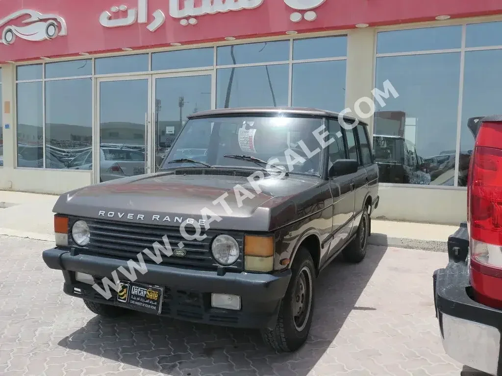 Land Rover  Range Rover  1990  Automatic  410,000 Km  8 Cylinder  Four Wheel Drive (4WD)  SUV  Brown  With Warranty
