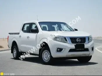 Nissan  Navara  SE  2017  Automatic  148,000 Km  4 Cylinder  Four Wheel Drive (4WD)  Pick Up  White  With Warranty