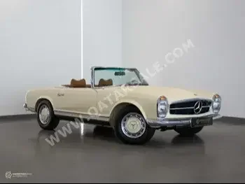 Mercedes-Benz  SL  280  1969  Automatic  450 Km  6 Cylinder  Rear Wheel Drive (RWD)  Convertible  Beige  With Warranty