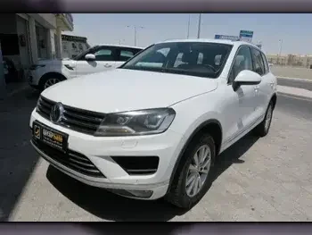 Volkswagen  Touareg  2016  Automatic  130,000 Km  6 Cylinder  All Wheel Drive (AWD)  SUV  White  With Warranty