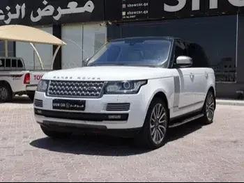  Land Rover  Range Rover  Vogue SE Super charged  2014  Automatic  174,000 Km  8 Cylinder  Four Wheel Drive (4WD)  SUV  White  With Warranty