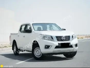 Nissan  Navara  SE  2017  Automatic  122,000 Km  4 Cylinder  Rear Wheel Drive (RWD)  Pick Up  White  With Warranty