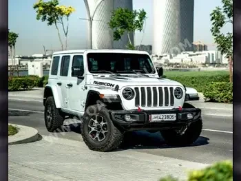Jeep  Wrangler  Rubicon  2022  Automatic  15,000 Km  6 Cylinder  Four Wheel Drive (4WD)  Pick Up  White  With Warranty