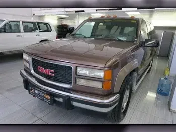 GMC  Suburban  1994  Automatic  125,000 Km  8 Cylinder  Four Wheel Drive (4WD)  SUV  Brown  With Warranty