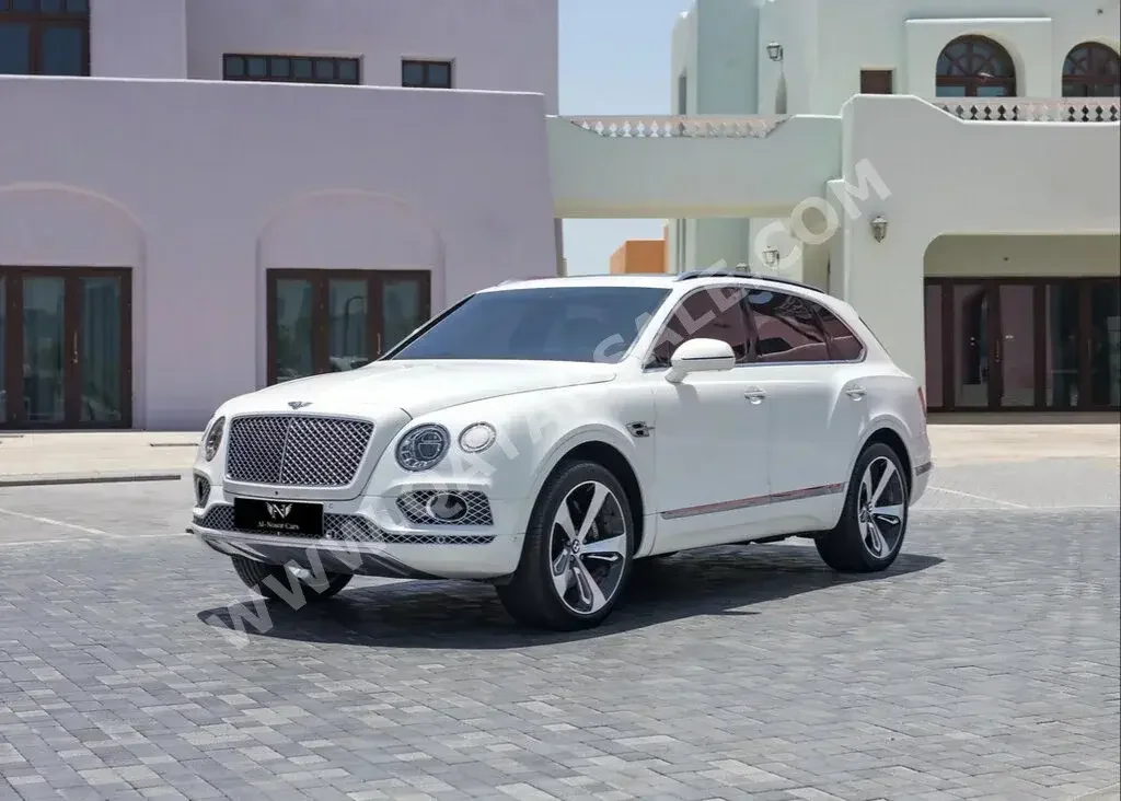 Bentley  Bentayga  2018  Automatic  72,000 Km  12 Cylinder  Four Wheel Drive (4WD)  SUV  White  With Warranty