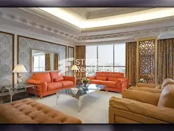 4 Bedrooms  Apartment  For Rent  in Doha -  West Bay  Fully Furnished