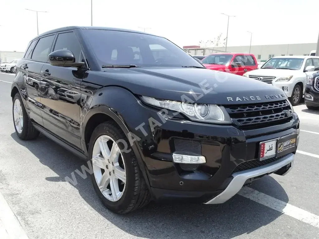 Land Rover  Evoque  2015  Automatic  110,000 Km  4 Cylinder  All Wheel Drive (AWD)  SUV  Black  With Warranty