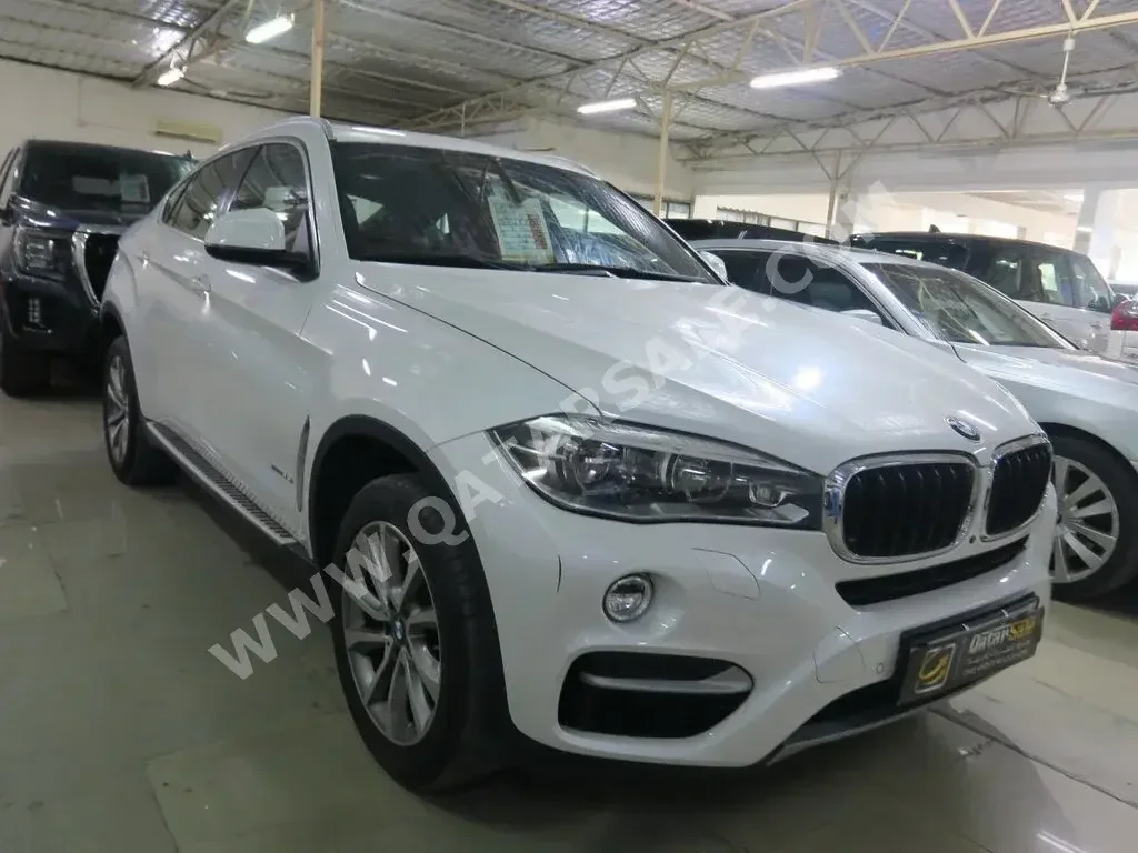 BMW  X-Series  X6  2016  Automatic  70,000 Km  6 Cylinder  Four Wheel Drive (4WD)  SUV  White  With Warranty