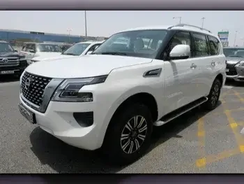 Nissan  Patrol  SE  2023  Automatic  0 Km  6 Cylinder  Four Wheel Drive (4WD)  SUV  White  With Warranty