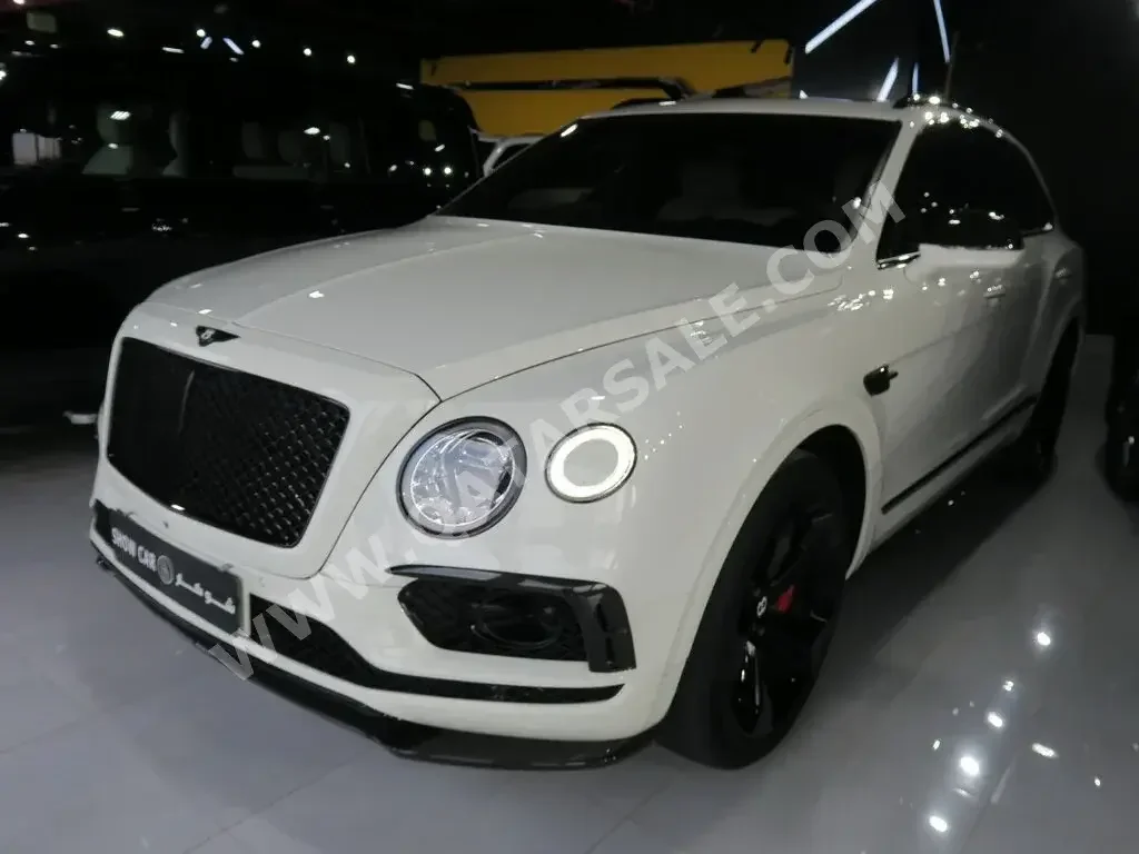 Bentley  Bentayga  2018  Automatic  31,000 Km  12 Cylinder  Four Wheel Drive (4WD)  SUV  White  With Warranty