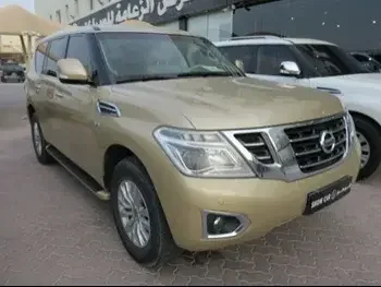 Nissan  Patrol  SE  2016  Automatic  260,000 Km  8 Cylinder  Four Wheel Drive (4WD)  SUV  Gold  With Warranty