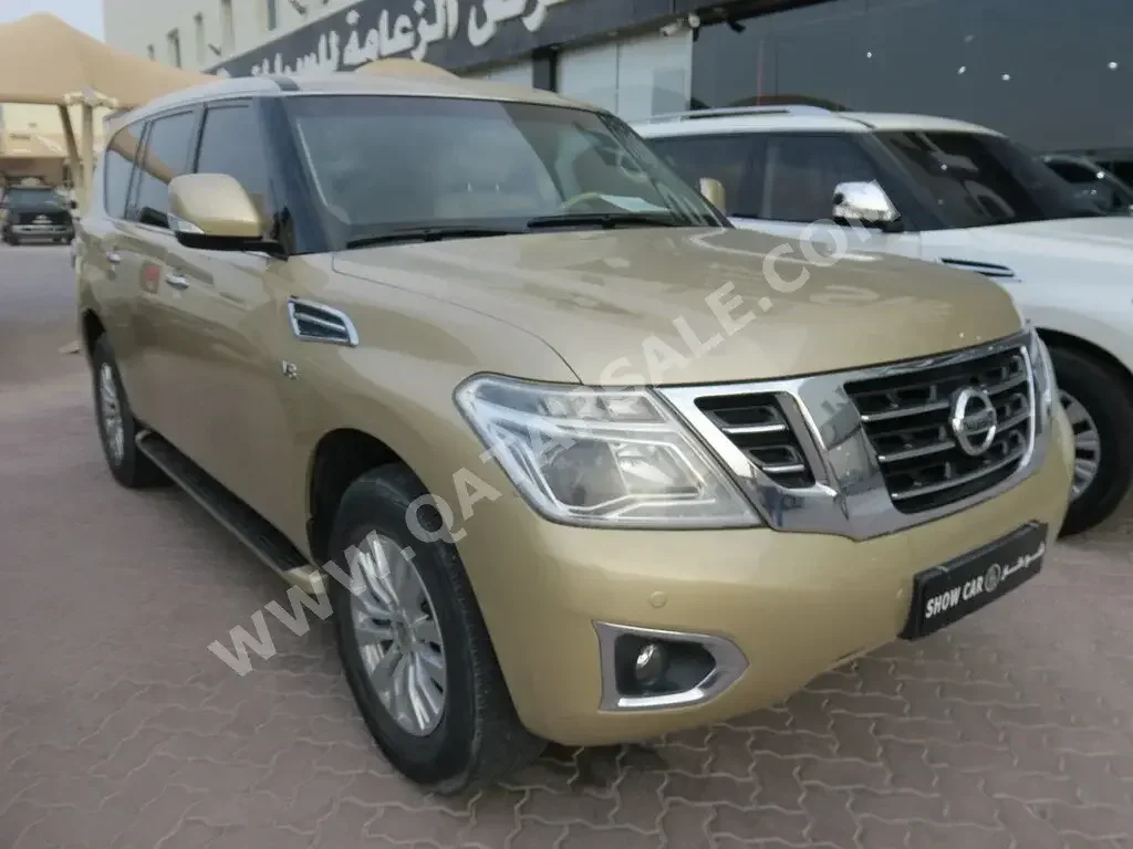 Nissan  Patrol  SE  2016  Automatic  260,000 Km  8 Cylinder  Four Wheel Drive (4WD)  SUV  Gold  With Warranty