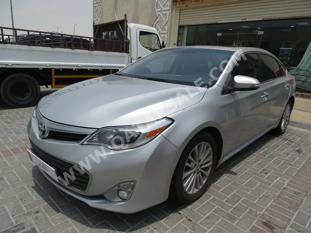 Toyota  Avalon  2013  Automatic  212,000 Km  6 Cylinder  Front Wheel Drive (FWD)  Sedan  Silver  With Warranty