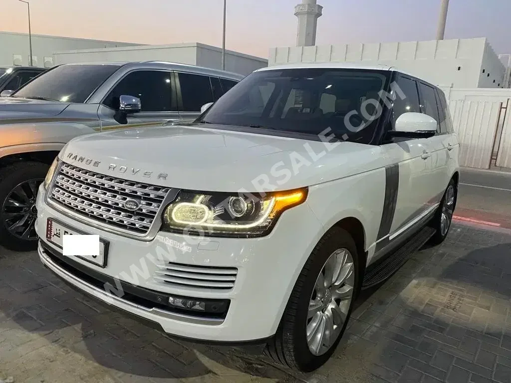 Land Rover  Range Rover  Vogue SE Super charged  2014  Automatic  46,000 Km  8 Cylinder  Four Wheel Drive (4WD)  SUV  White  With Warranty