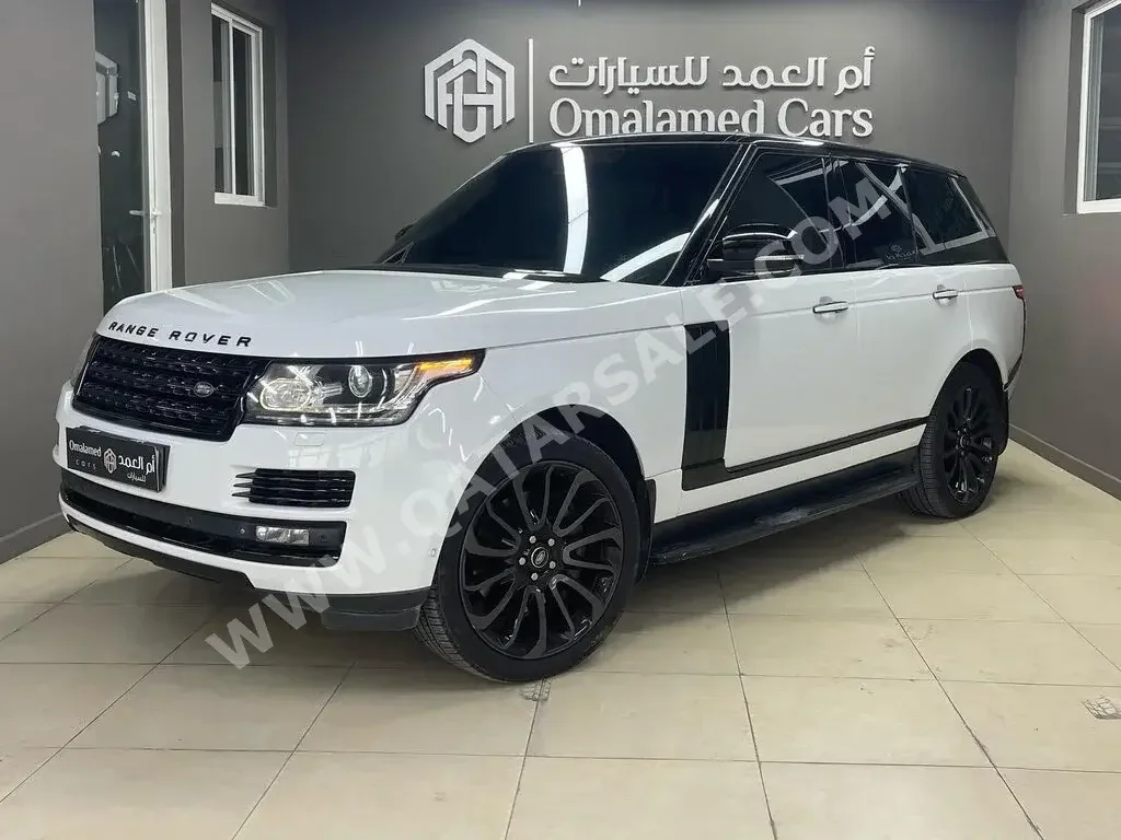 Land Rover  Range Rover  Vogue SE  2014  Automatic  193,000 Km  8 Cylinder  Four Wheel Drive (4WD)  SUV  White  With Warranty
