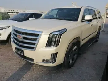Cadillac  Escalade  2015  Automatic  137,000 Km  8 Cylinder  Four Wheel Drive (4WD)  SUV  White  With Warranty
