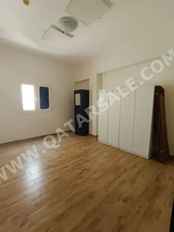 3 Bedrooms  Apartment  For Rent  in Doha -  Fereej Al Nasr  Not Furnished