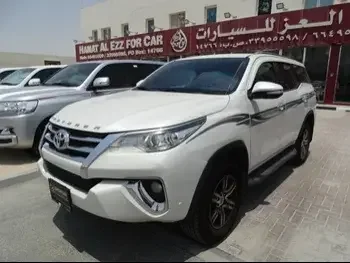 Toyota  Fortuner  2017  Automatic  140,000 Km  4 Cylinder  Four Wheel Drive (4WD)  SUV  White  With Warranty
