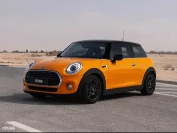 Mini  Cooper  2018  Automatic  39,000 Km  3 Cylinder  Front Wheel Drive (FWD)  Hatchback  Orange  With Warranty