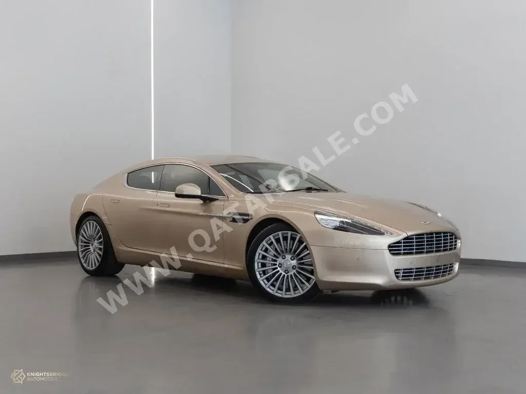 Aston Martin  Rapide  2011  Automatic  35,900 Km  12 Cylinder  Rear Wheel Drive (RWD)  Coupe / Sport  Beige