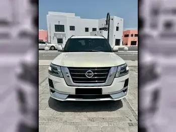 Nissan  Patrol  LE  2010  Automatic  180,000 Km  8 Cylinder  Four Wheel Drive (4WD)  SUV  White  With Warranty