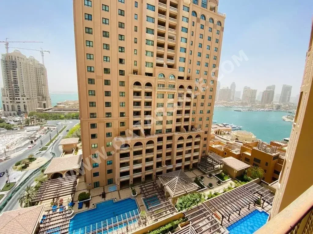 2 Bedrooms  Apartment  For Sale  in Doha -  The Pearl  Semi Furnished