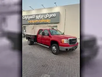 GMC  Sierra  3500 HD  2009  Automatic  33,000 Km  8 Cylinder  Four Wheel Drive (4WD)  Pick Up  Red  With Warranty