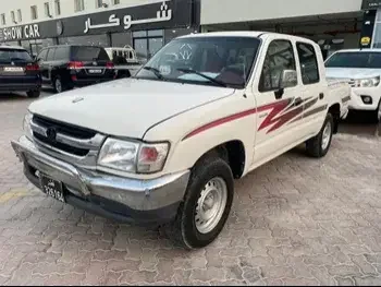 Toyota  Hilux  2002  Manual  380,000 Km  4 Cylinder  Four Wheel Drive (4WD)  Pick Up  White  With Warranty