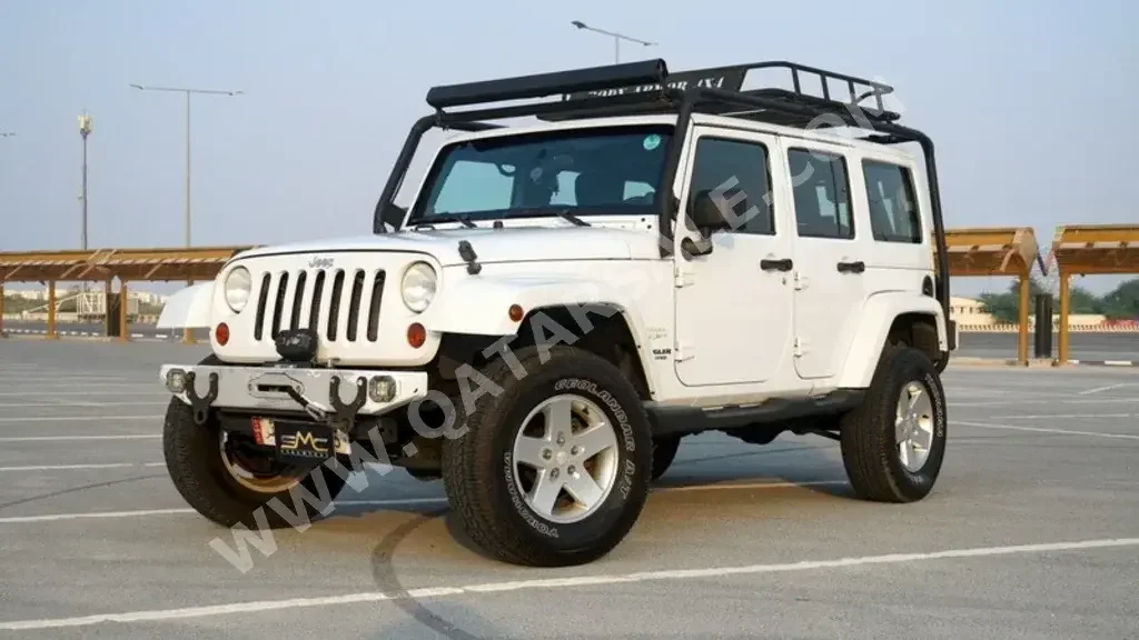 Jeep  Wrangler  Unlimited  2011  Automatic  180,000 Km  6 Cylinder  Four Wheel Drive (4WD)  SUV  White  With Warranty