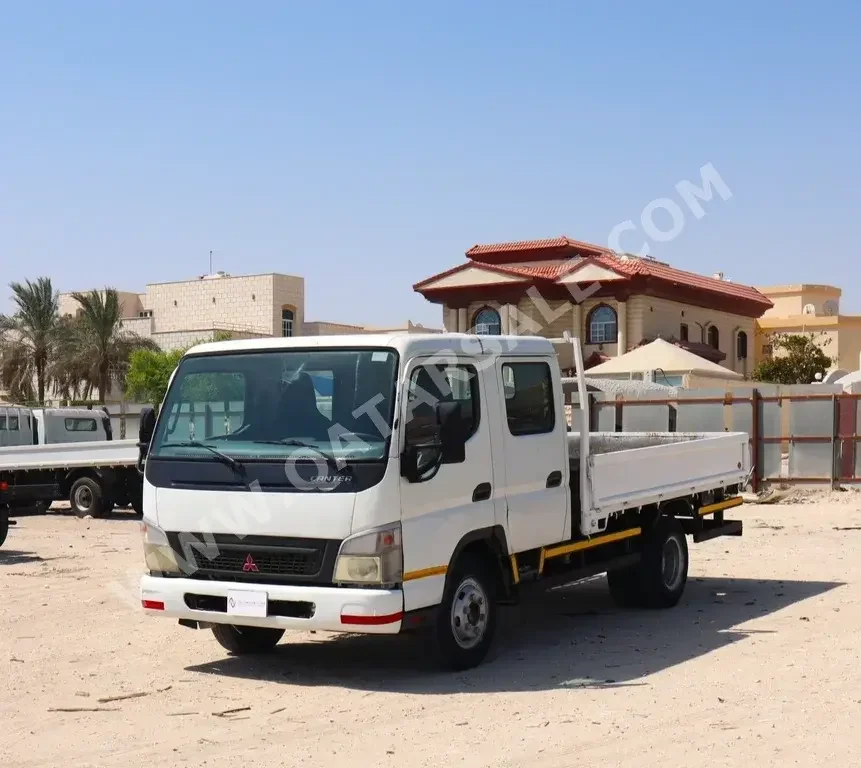 Mitsubishi  Fuso Canter  2015  Manual  230,000 Km  4 Cylinder  Rear Wheel Drive (RWD)  Pick Up  White  With Warranty