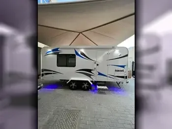 Caravan - 2023  - White  -Made in Qatar  - 0 Km